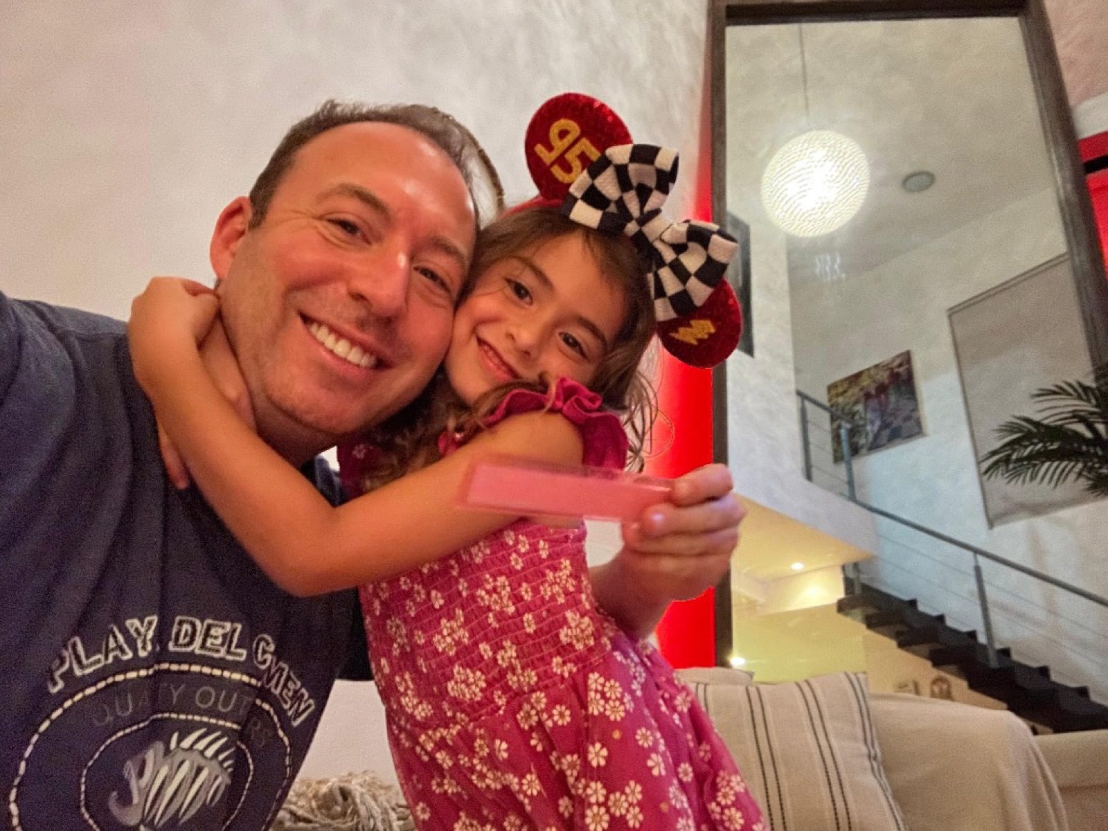 Mike Eisenberg hugging his daughter Billie