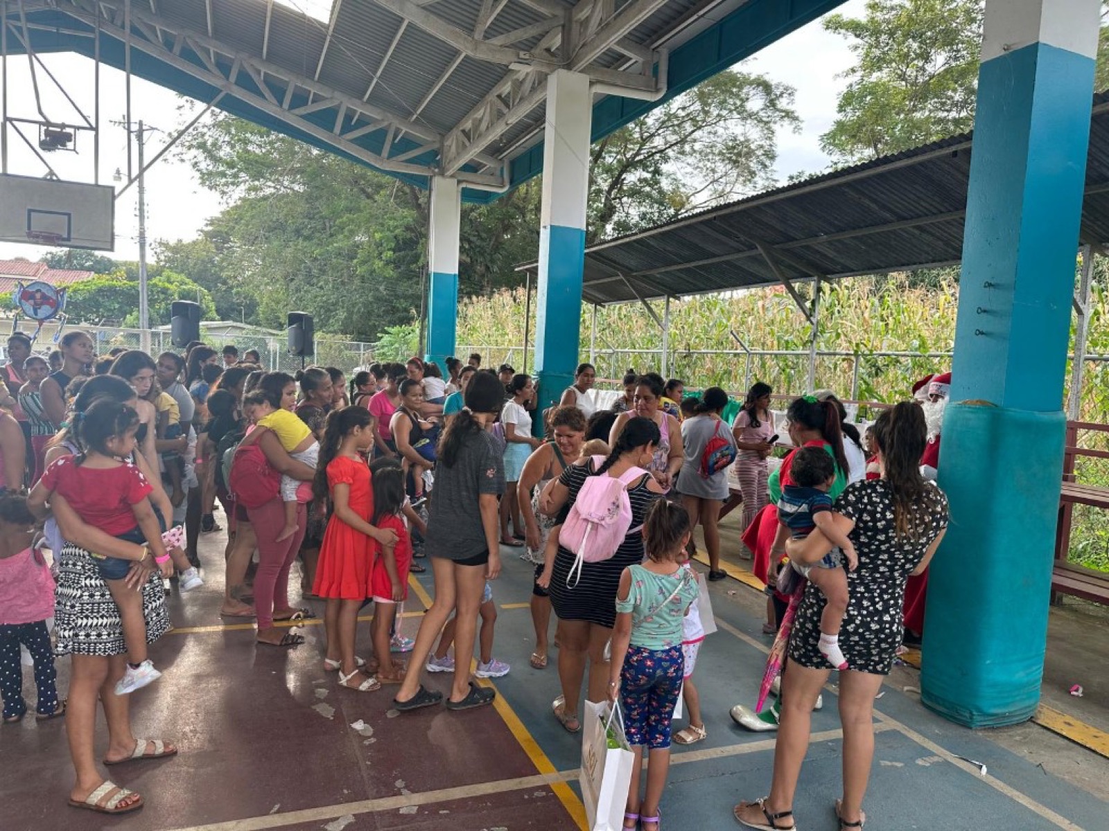 Moms and kids lining up for gifts