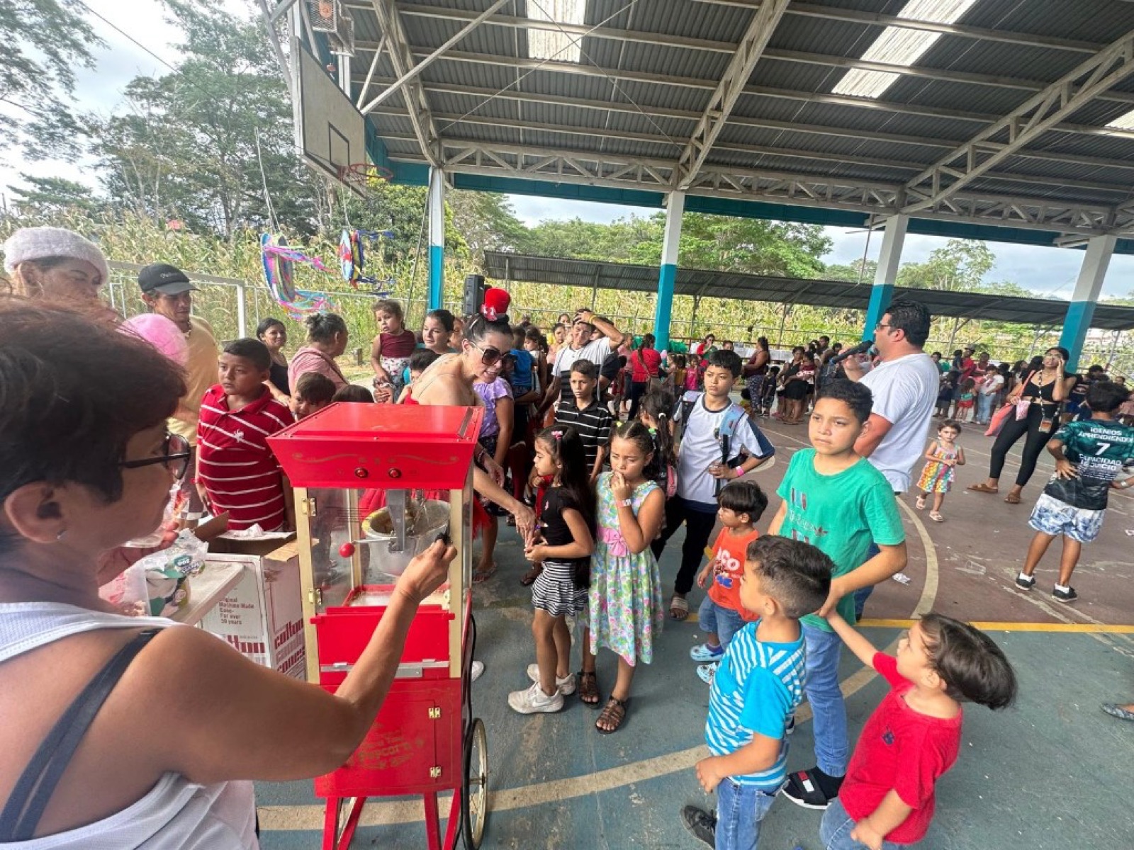 Kids lining up for fresh popcorn